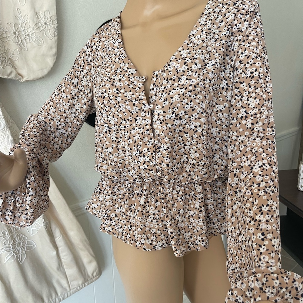 Floral silk like flowy peplum top